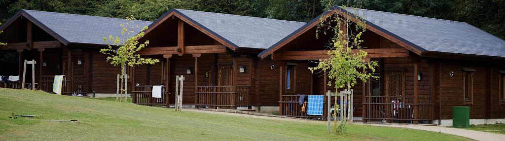 three log cabins at Danbury