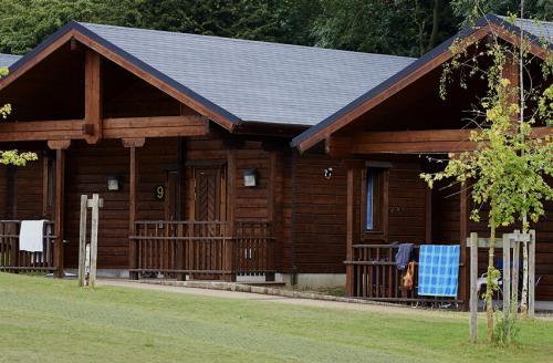 three log cabins at Danbury