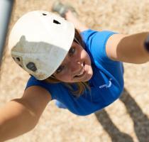 instructor looking up through climbing frame