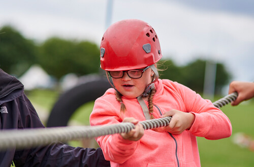 disabled girl pulling rope