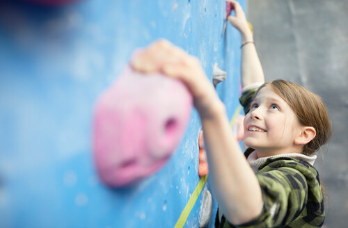 Girl climbing at The Lock