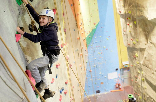 boy climbing at the lock