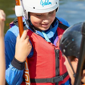 group of children and sup instructor