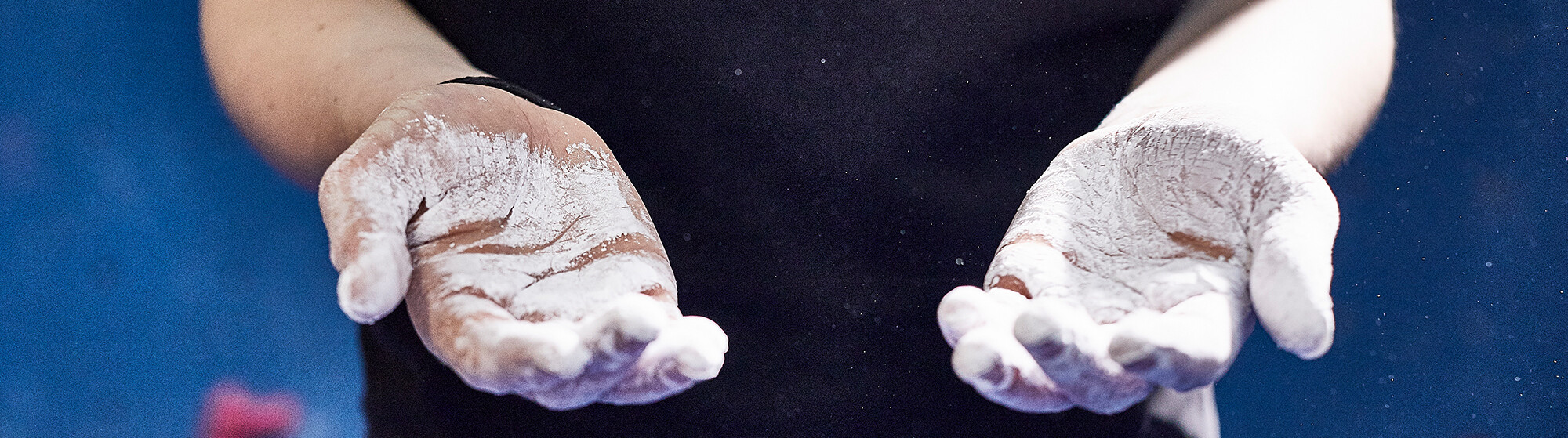 hands with climbing chalk