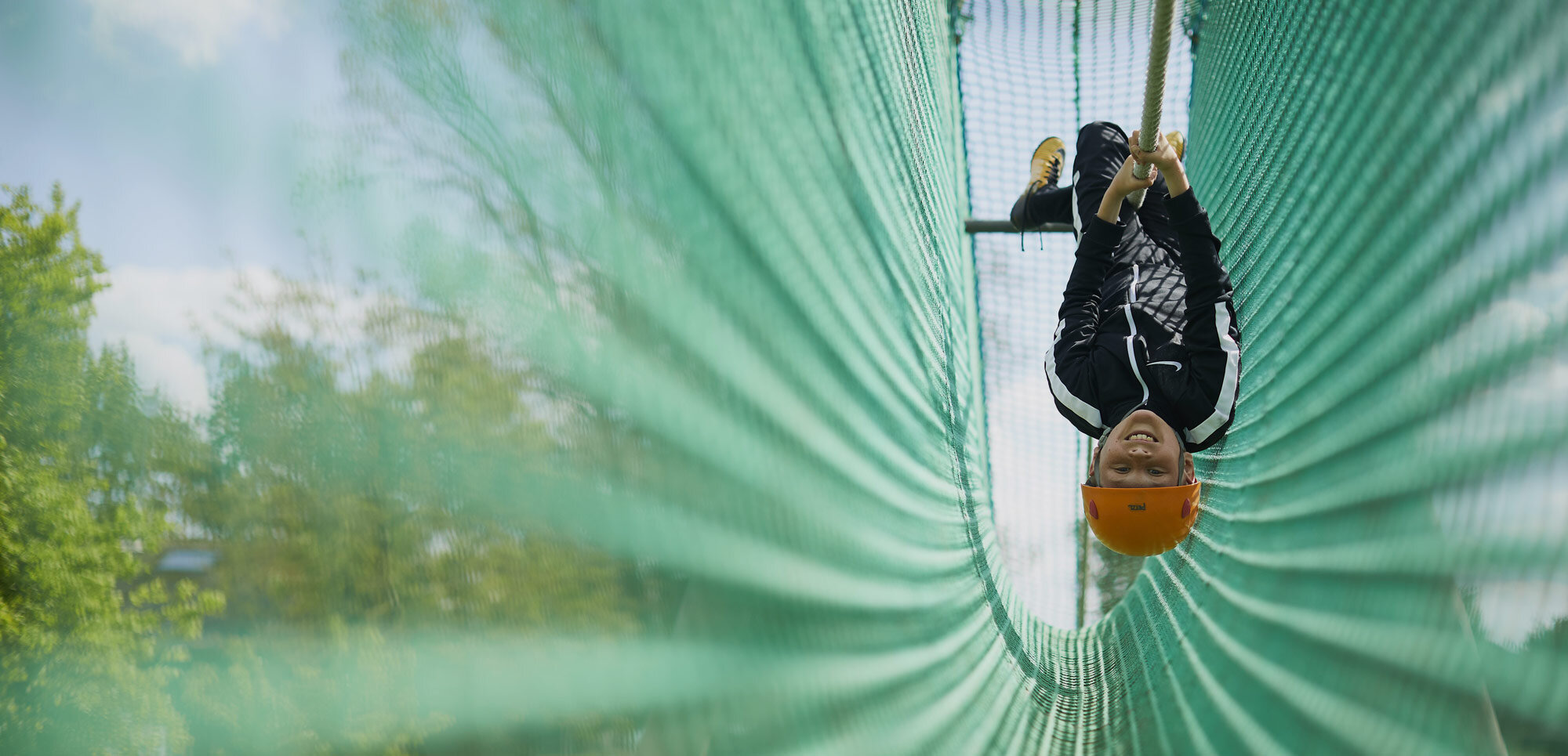 Boy on high ropes