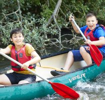 Two boys in a canoe