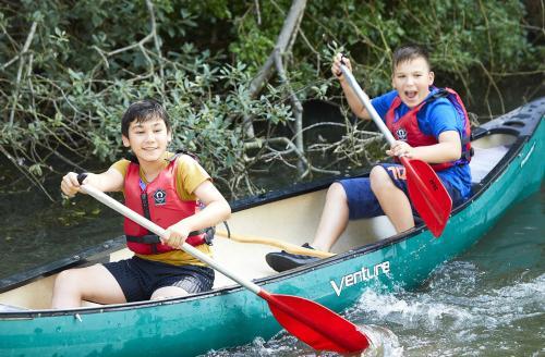 Two boys in a canoe