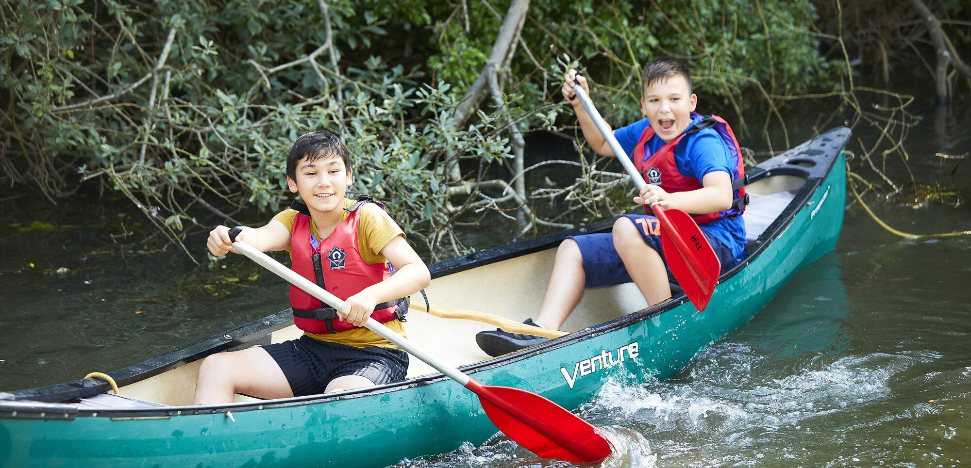 Two boys in a canoe