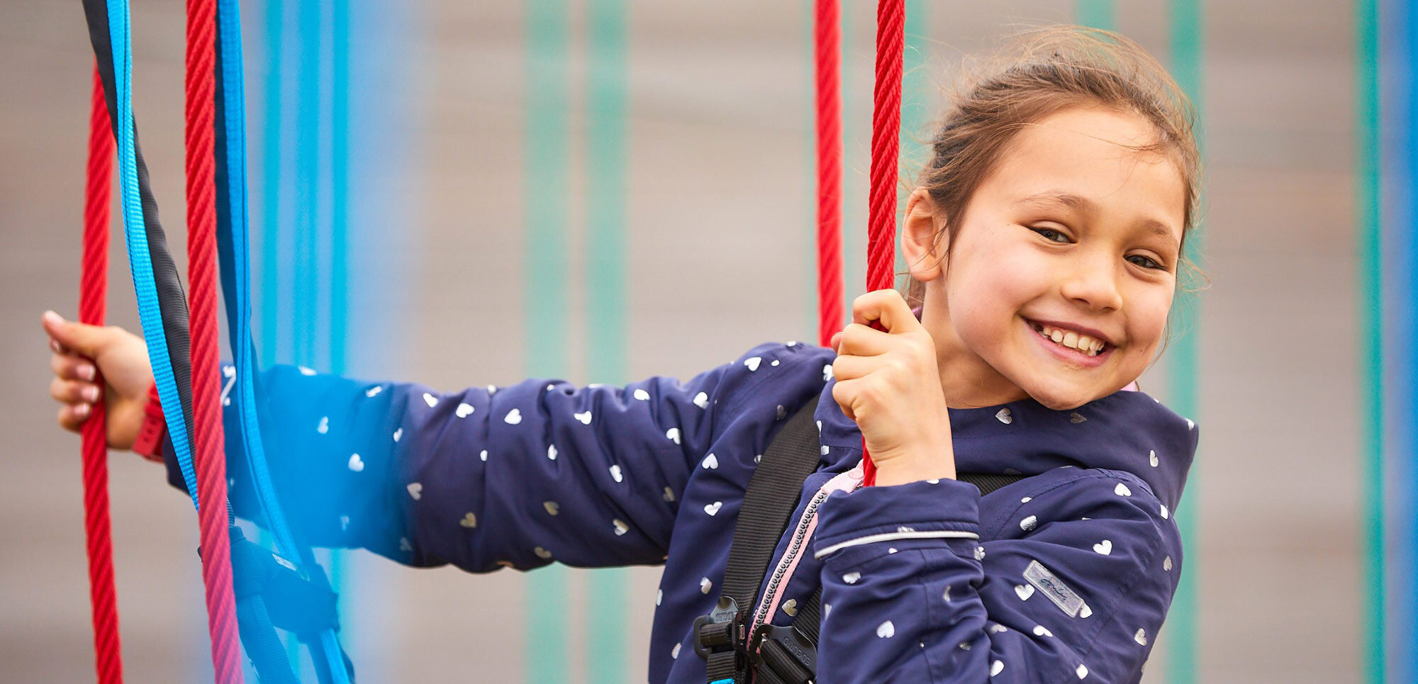 Young girl using ropes